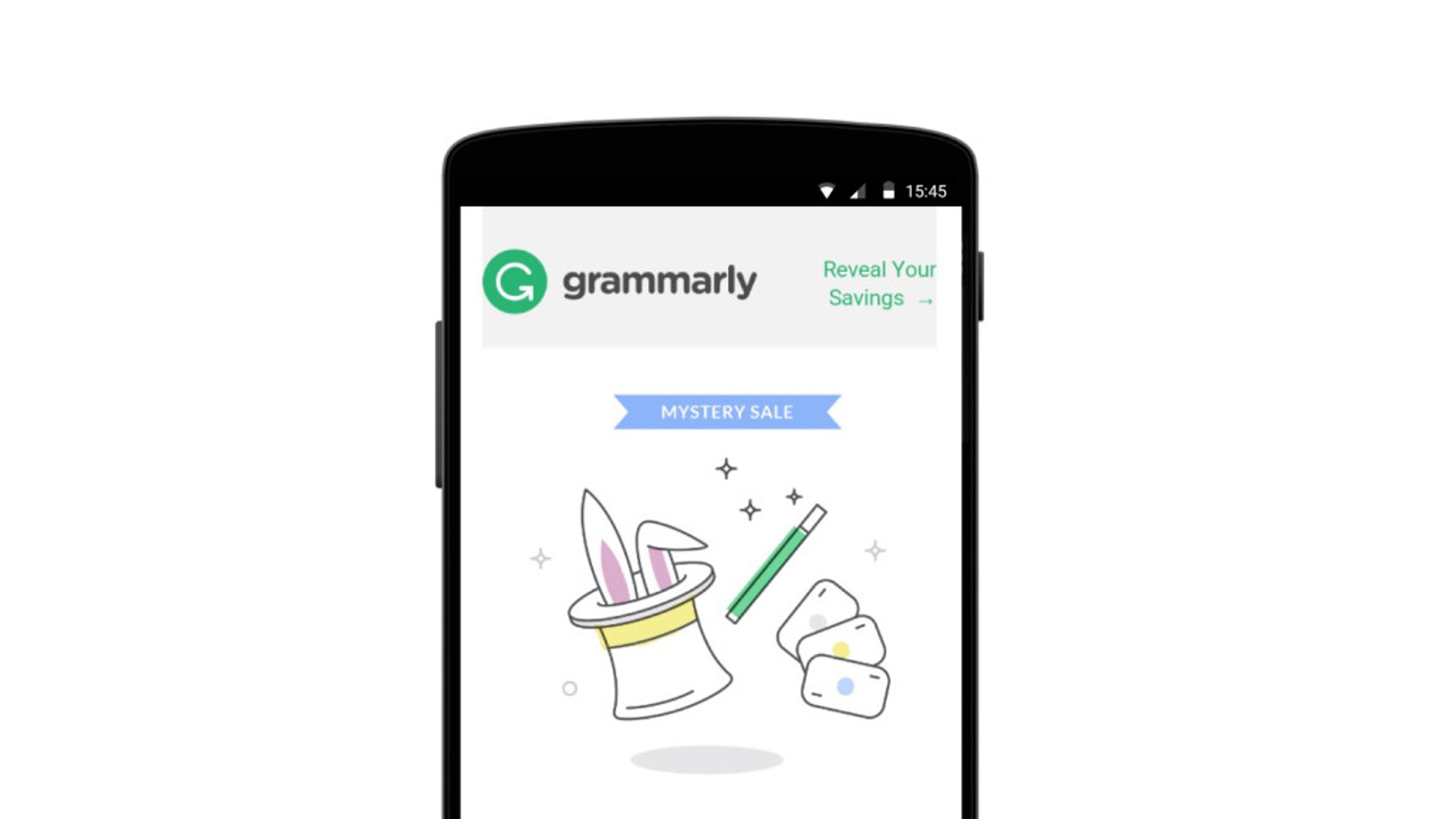 A smartphone displaying a Grammarly advertisement for a mystery sale, featuring a magician's hat, a pencil, and dice.