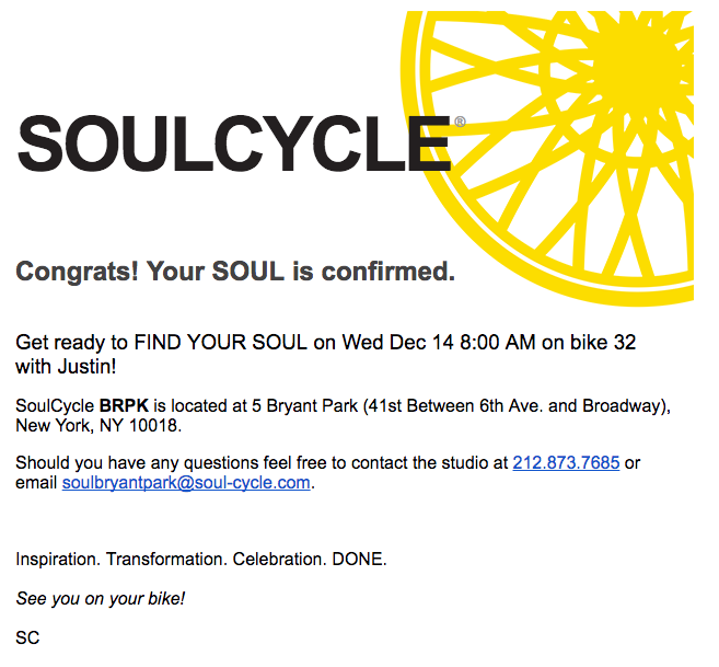 Confirmation email for a SoulCycle class on December 14 at 8:00 AM, bike 32. Includes location details and contact information.