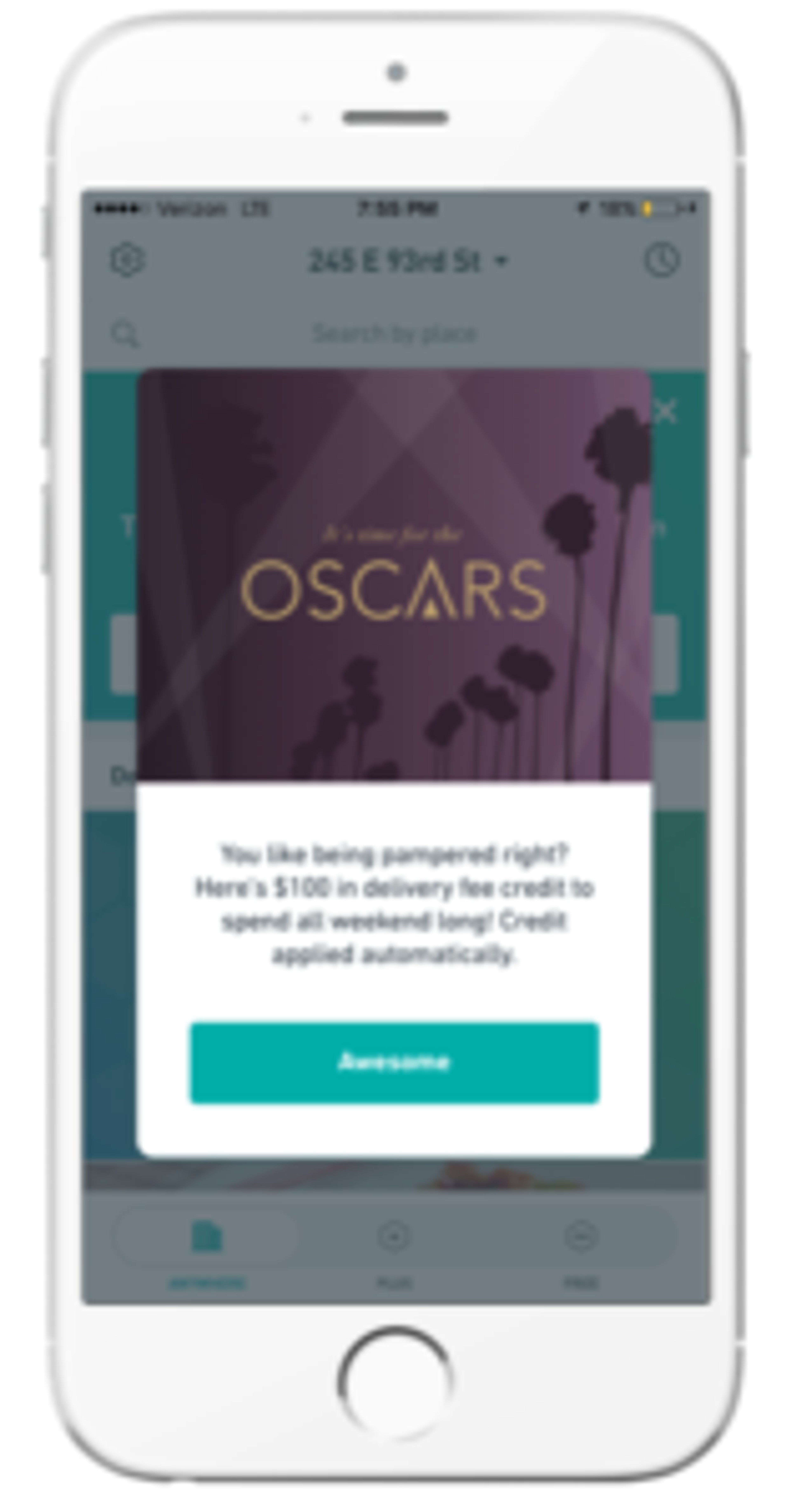 A smartphone screen displaying a promotional message for the Oscars, offering $100 in delivery credit for the weekend. The background features palm trees and a purple banner with the text "It's time for the OSCARS.