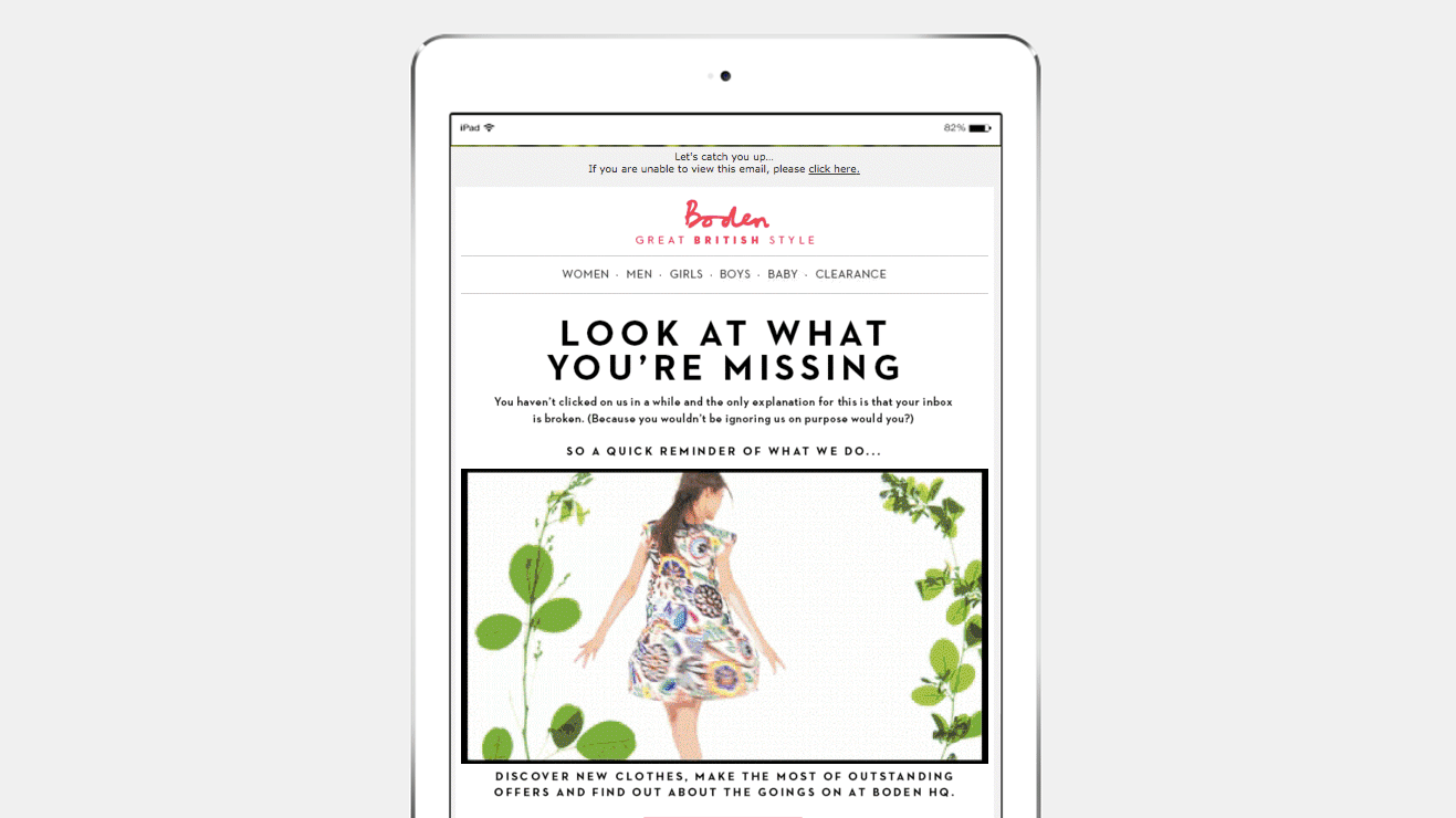 A tablet displaying a fashion email from Boden, featuring a model in a floral dress and text highlighting new clothing offers.