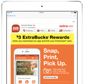 A promotional email from CVS on a tablet screen, advertising $3 ExtraBucks Rewards for downloading their app. The message encourages users to snap, print, and pick up photos.