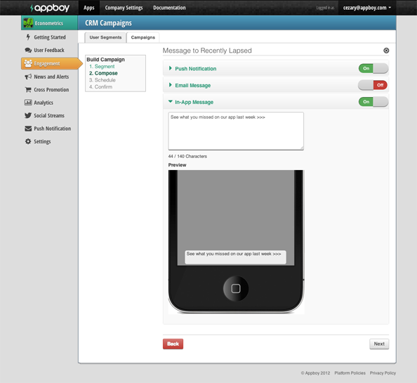A screenshot of a CRM campaign management interface showing options to create a push notification, email message, and in-app message. The preview area displays a message about app updates.