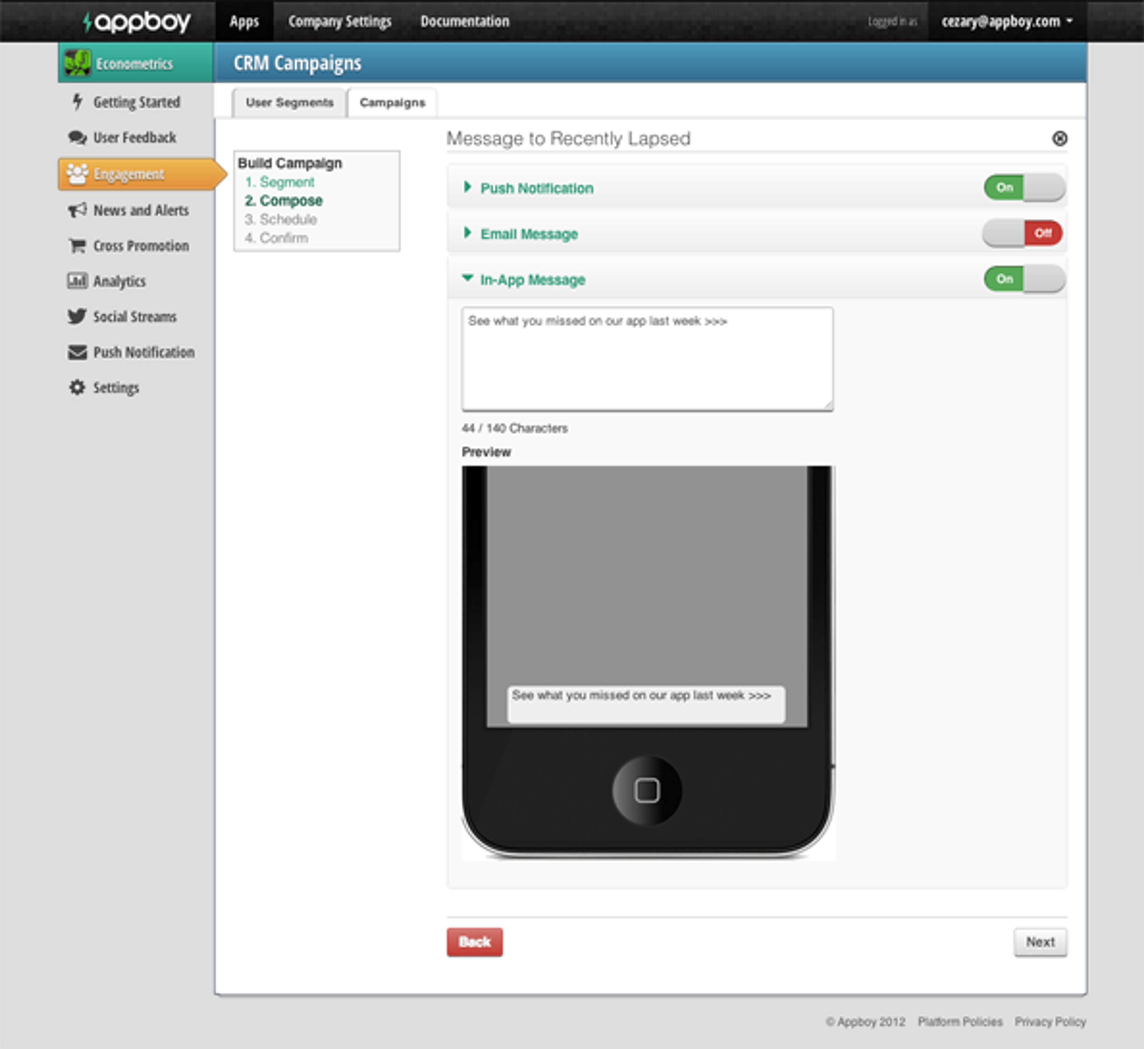 A screenshot of a CRM campaign management interface showing options to create a push notification, email message, and in-app message. The preview area displays a message about app updates.