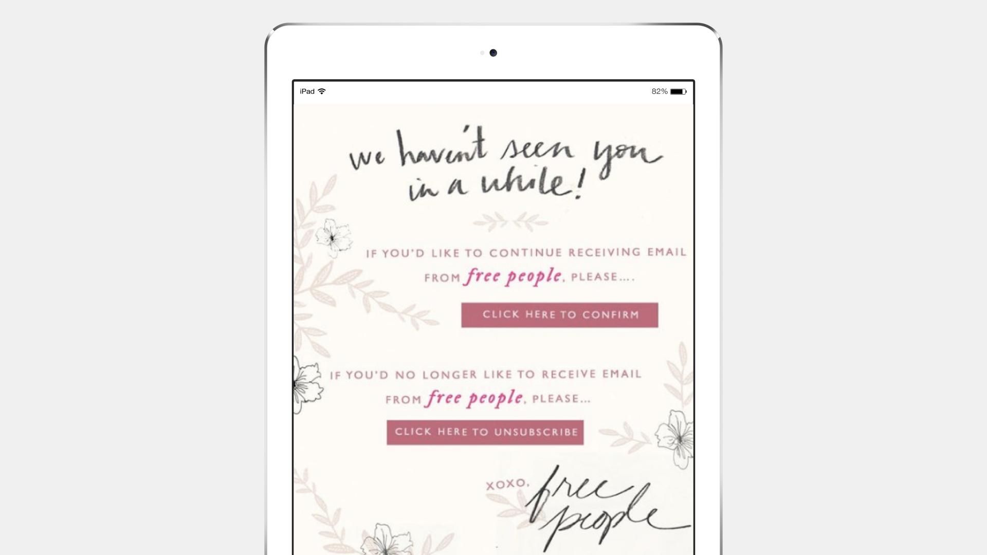 A digital tablet displaying an email confirmation page from Free People, with options to confirm or unsubscribe from emails. The design features floral elements and a handwritten-style font.