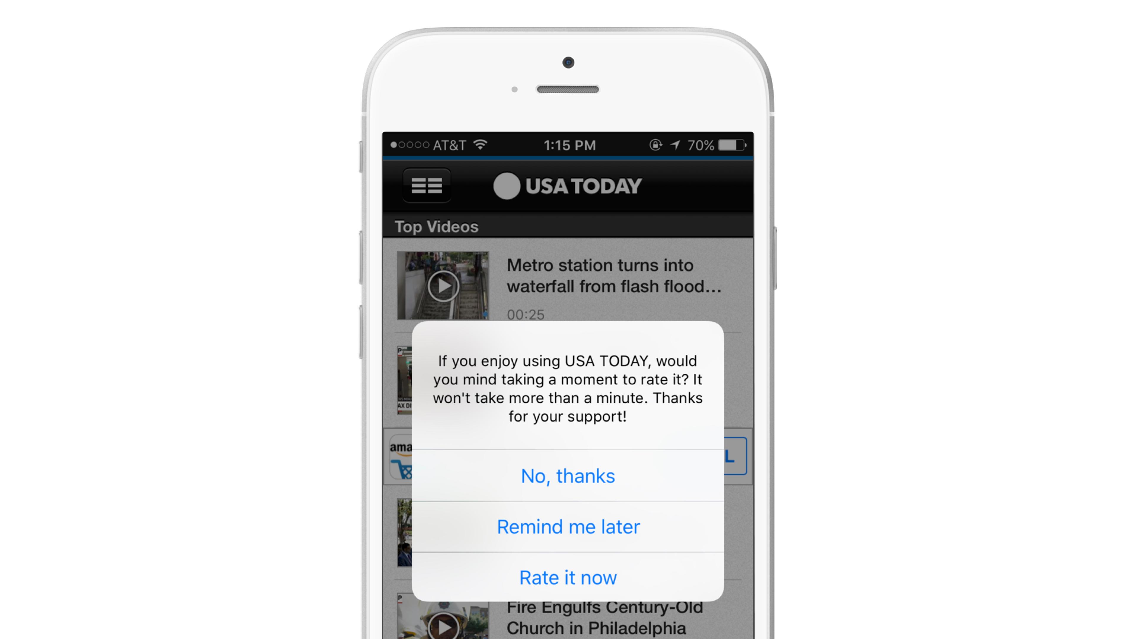 A smartphone screen displaying a pop-up message from the USA TODAY app asking users to rate their experience. The options include "No, thanks," "Remind me later," and "Rate it now.