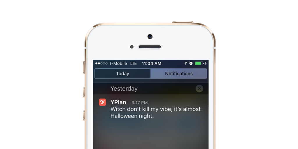 A smartphone screen displaying a notification from YPlan that reads, "Witch don't kill my vibe, it's almost Halloween night.