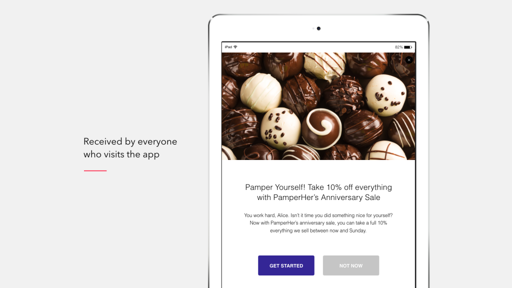A tablet displaying a promotional message for Pampered Chef's Anniversary Sale, featuring an assortment of chocolate truffles. The message offers a 10% discount on all items.