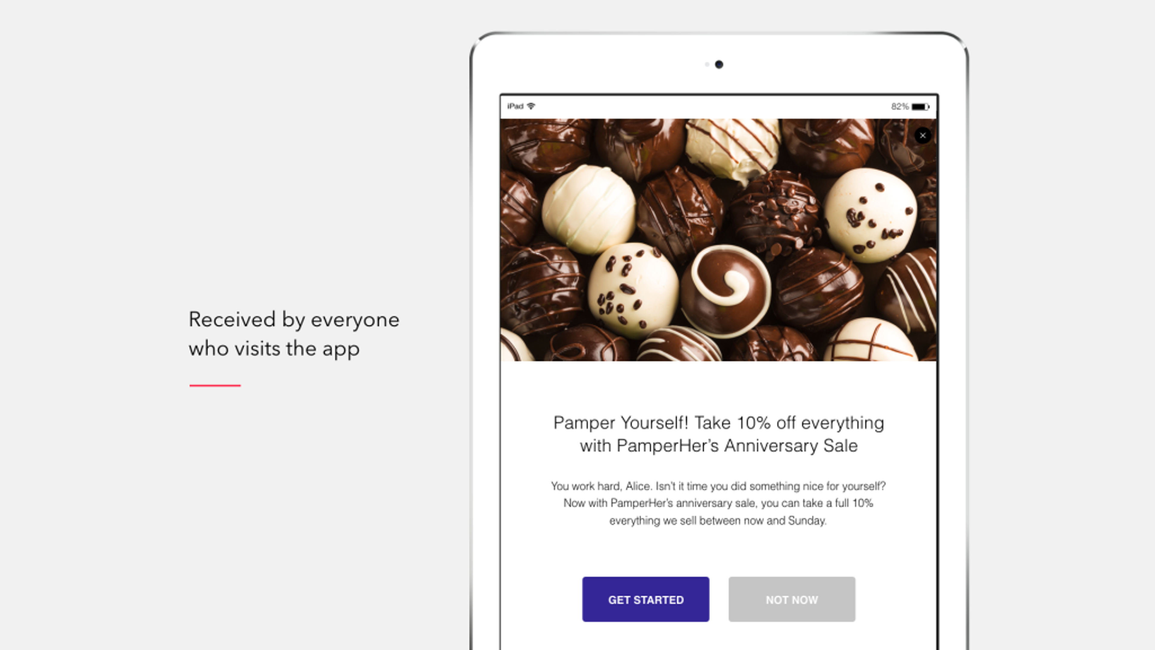 A tablet displaying a promotional message for Pampered Chef's Anniversary Sale, featuring an assortment of chocolate truffles. The message offers a 10% discount on all items.