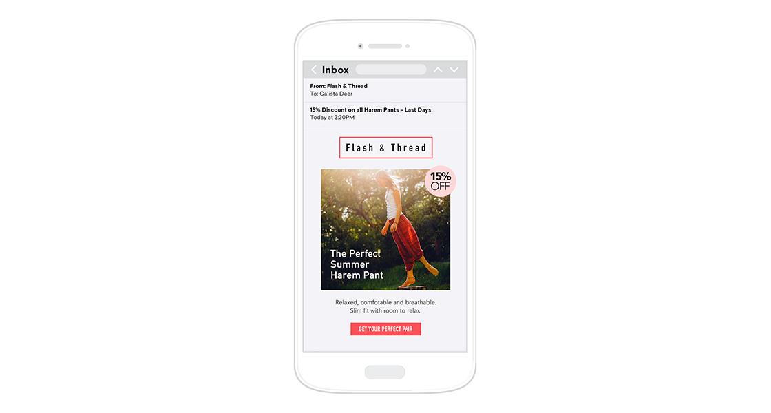 A mobile phone displaying an email from Flash & Thread promoting a 15% discount on summer harem pants. The email highlights a relaxed and comfortable style.