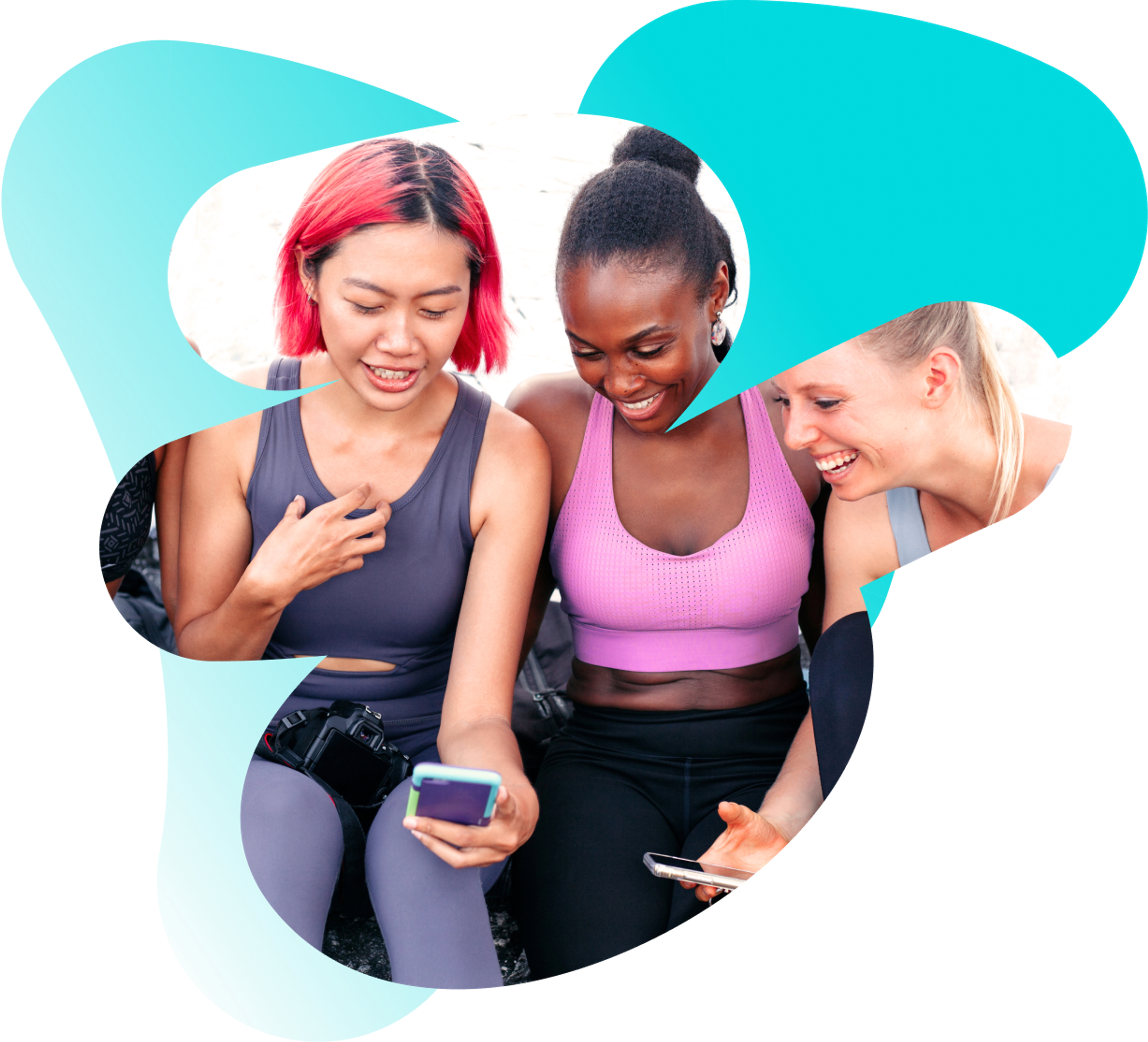 three women are looking at their cell phones and smiling