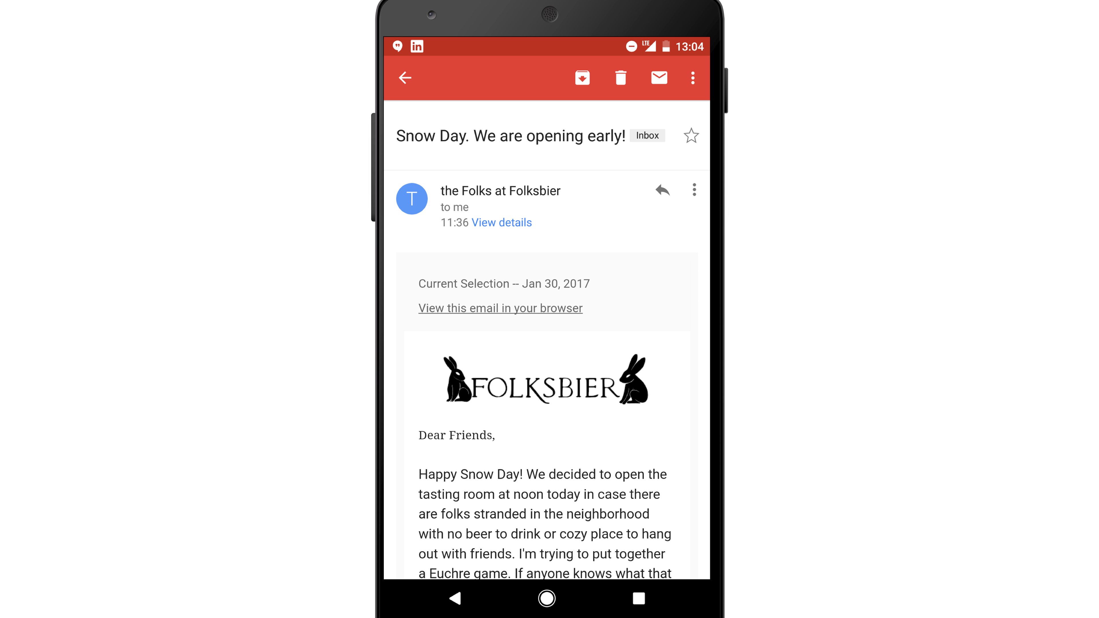 A smartphone displaying an email announcement about an early opening due to snow, featuring the logo of Folksbier. The email includes a friendly greeting and details about the tasting room.