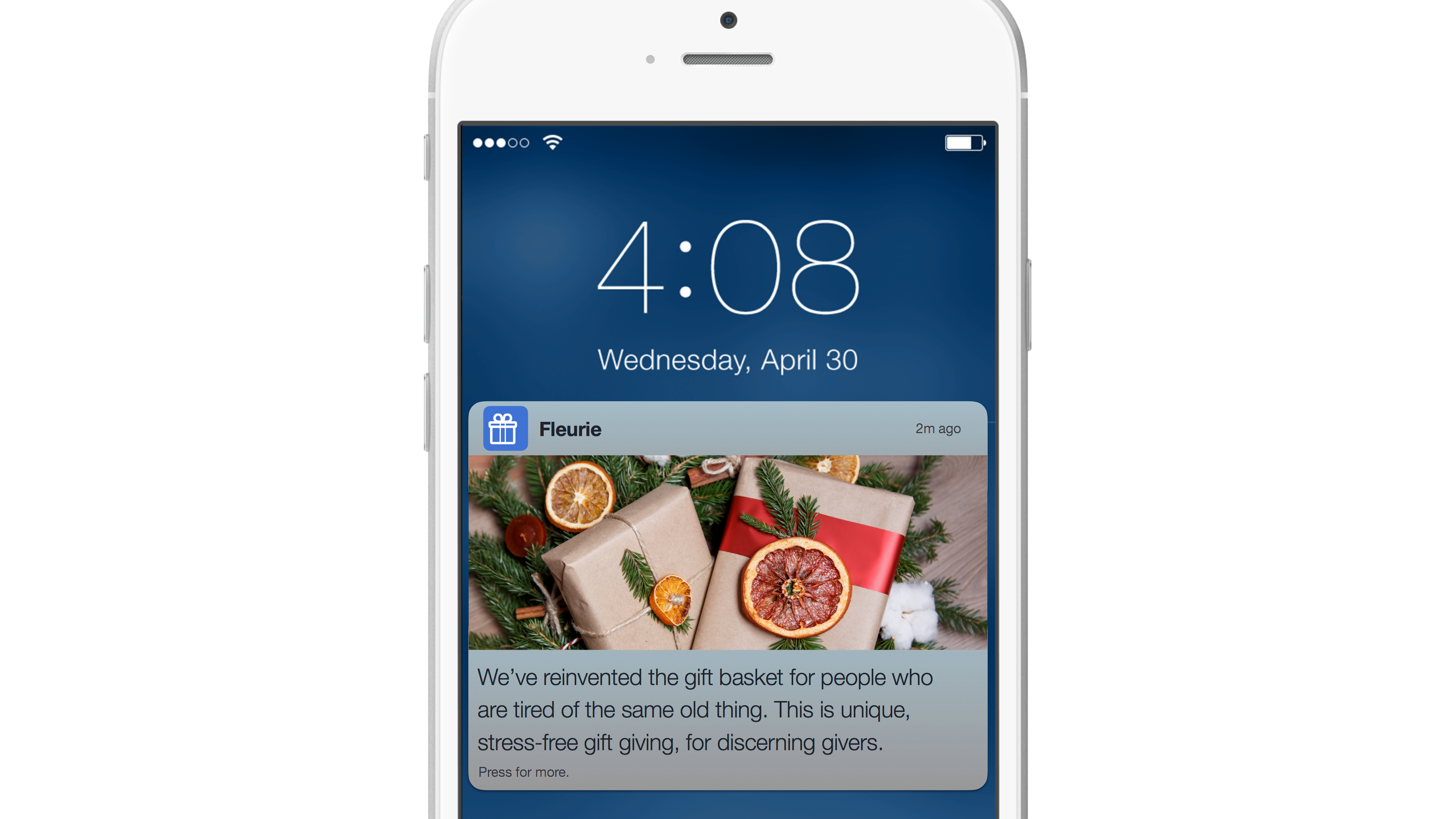 A smartphone screen displaying a notification about a unique gift basket service, featuring a festive background with wrapped gifts and dried fruit. The time is 4:08 PM on Wednesday, April 30.