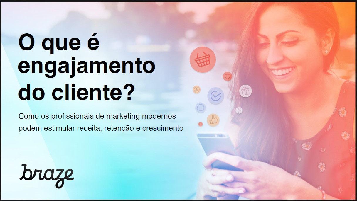 a woman is smiling while looking at her cell phone .