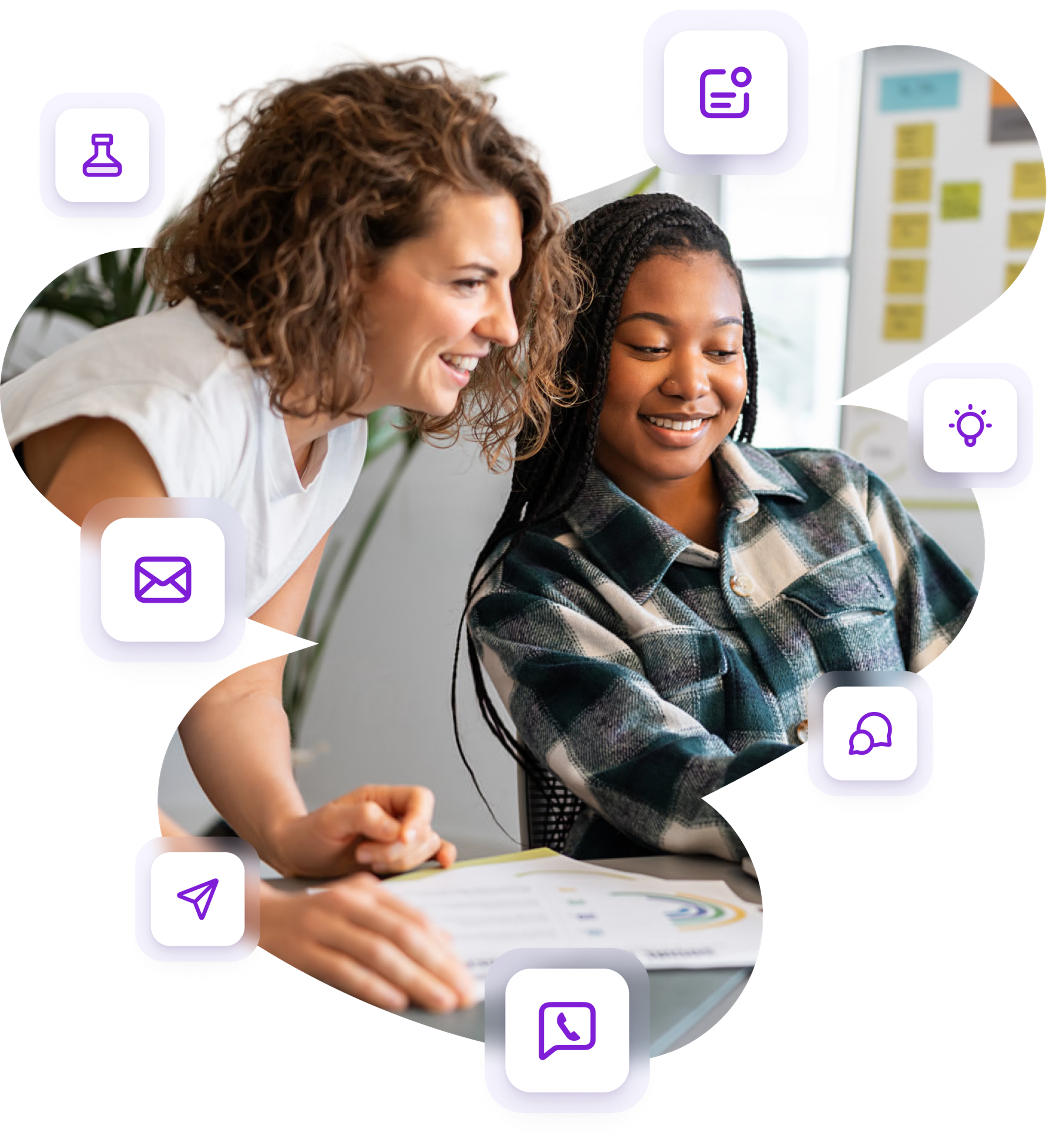 Two colleagues smile and collaborate at a desk with a laptop, surrounded by floating purple icons representing communication and digital tools.