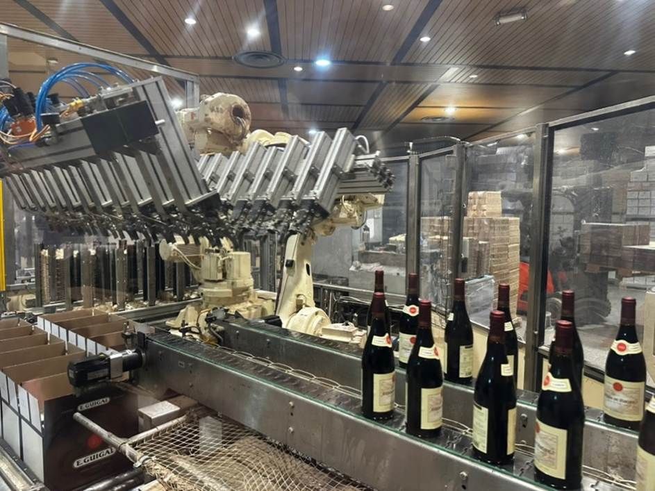 Bottles moving along the Guigal bottling line