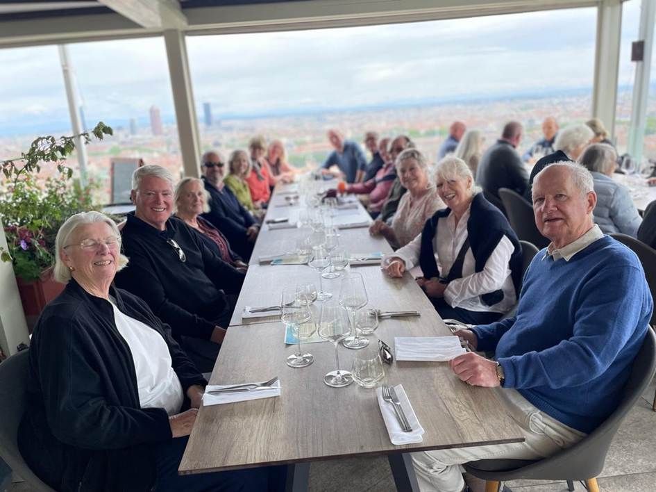 The Court at lunch on a rooftop overlooking Lyon