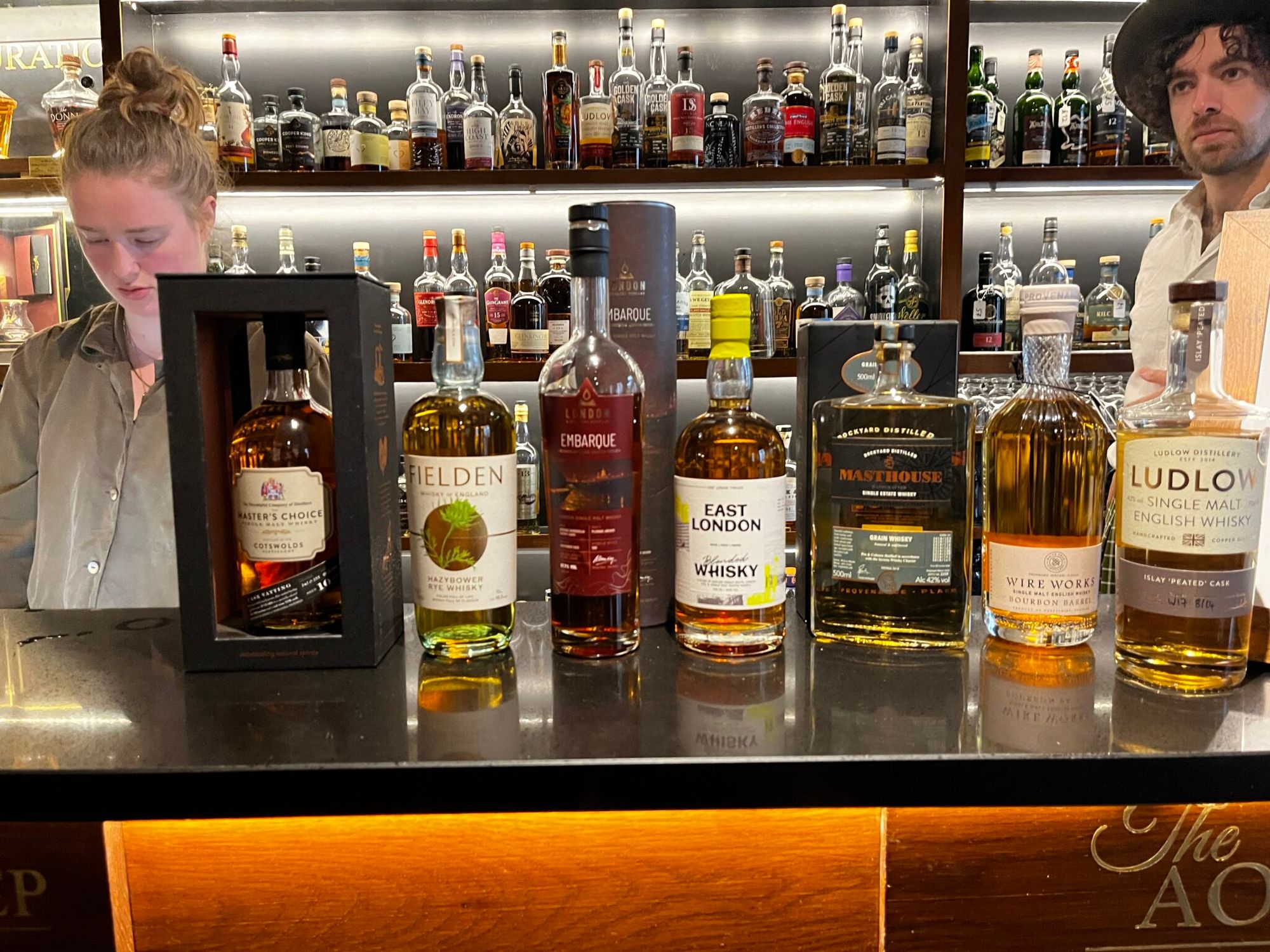 English whisky bottles lined up, including Fielden, East London Liquor, Masthouse, Wire Works, Ludlow and Master’s Choice