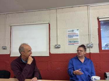 Two members of the Action for Children team in conversation
