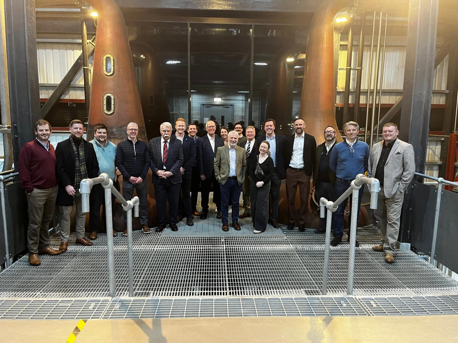 Distillers’ Company members gathered in the still house at a Port of Leith social.