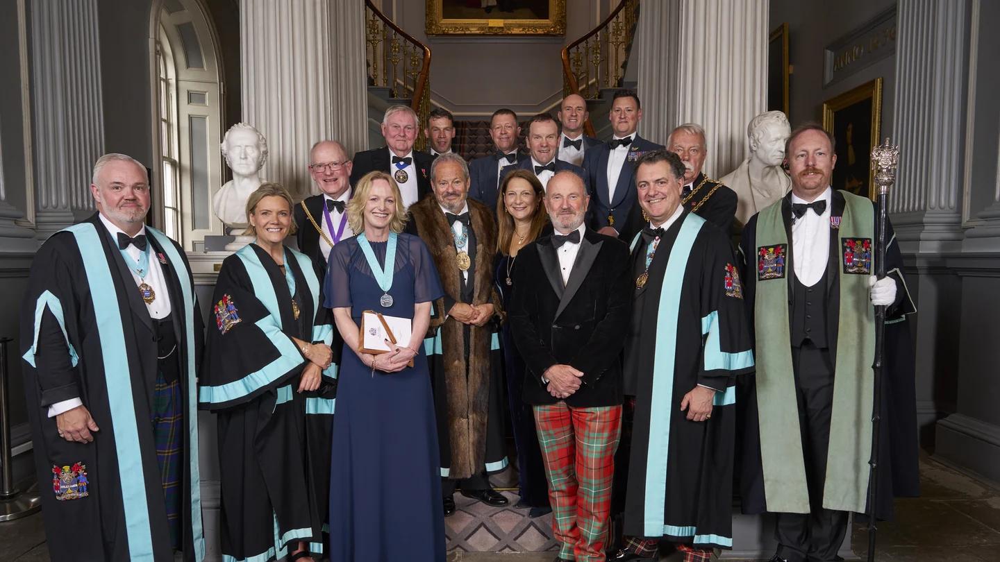 Company members gathered at a Scottish event.