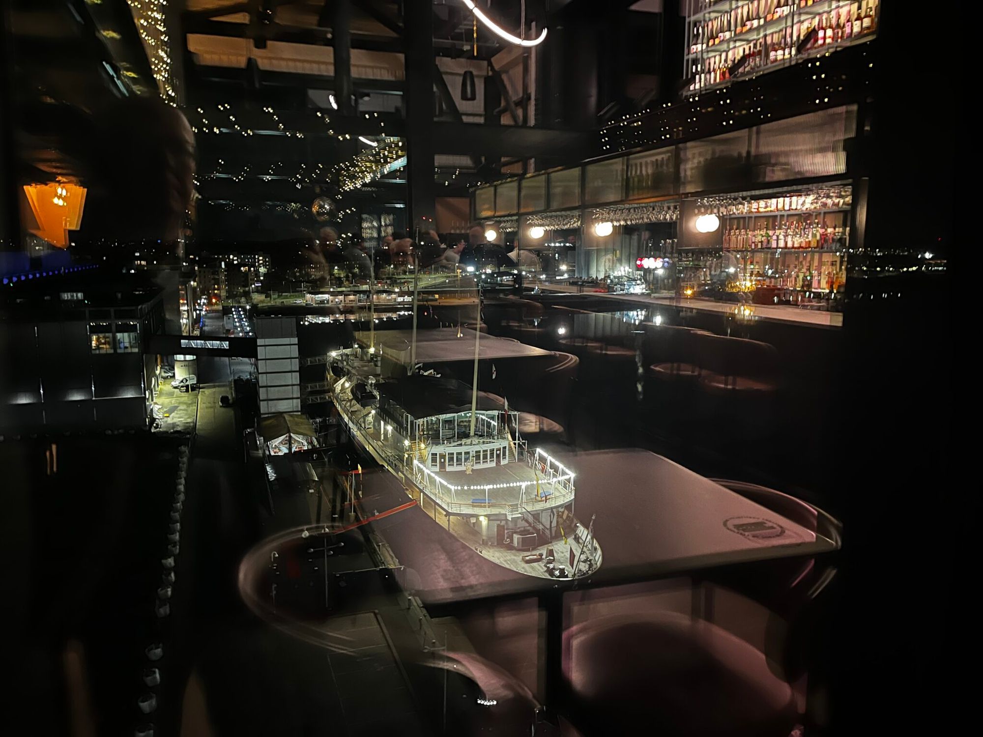 The Royal Yacht Britannia at night, seen from the bar window