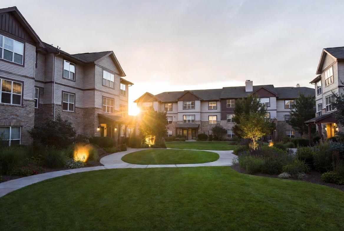 A condo with professional lawn care