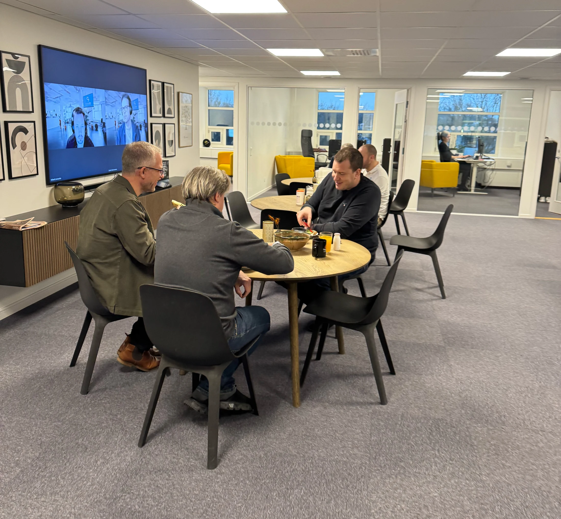 Some of our colleagues enjoying breakfast at the office