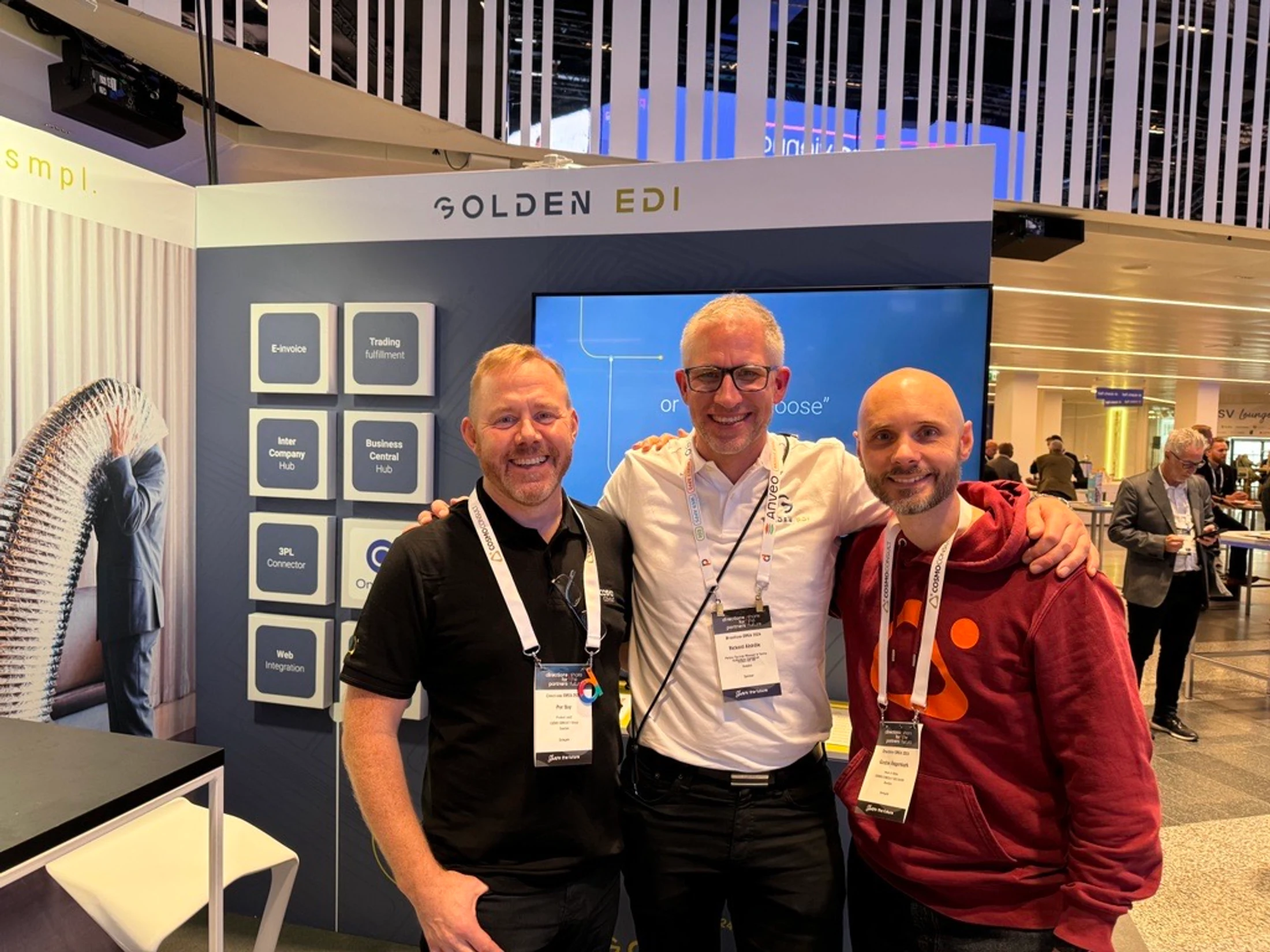Rickard Alstråle with our partners from Cosmo Consulting, standing in Golden EDI’s booth at Directions EMEA.