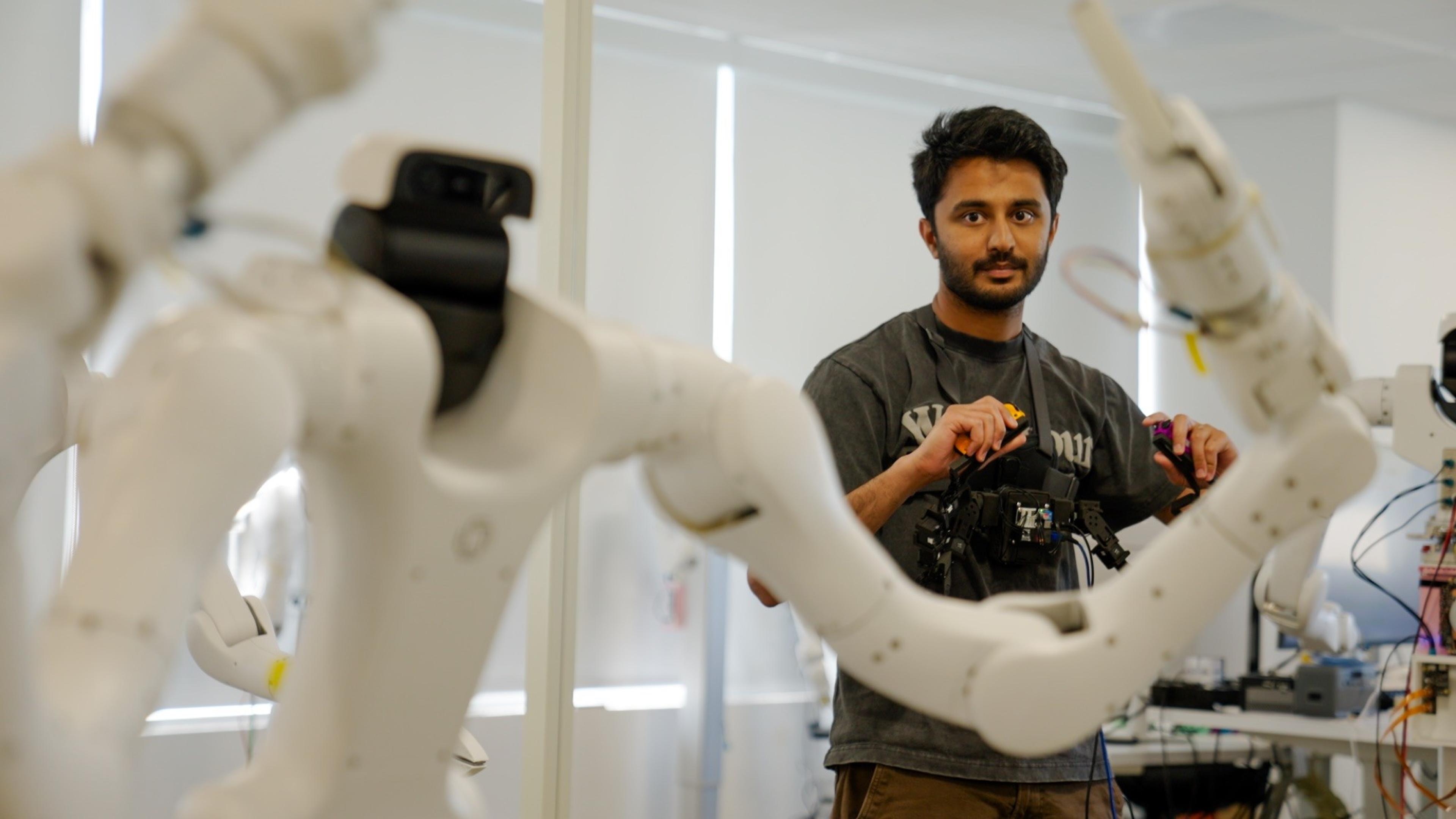 A Dexmate engineer working with Vega