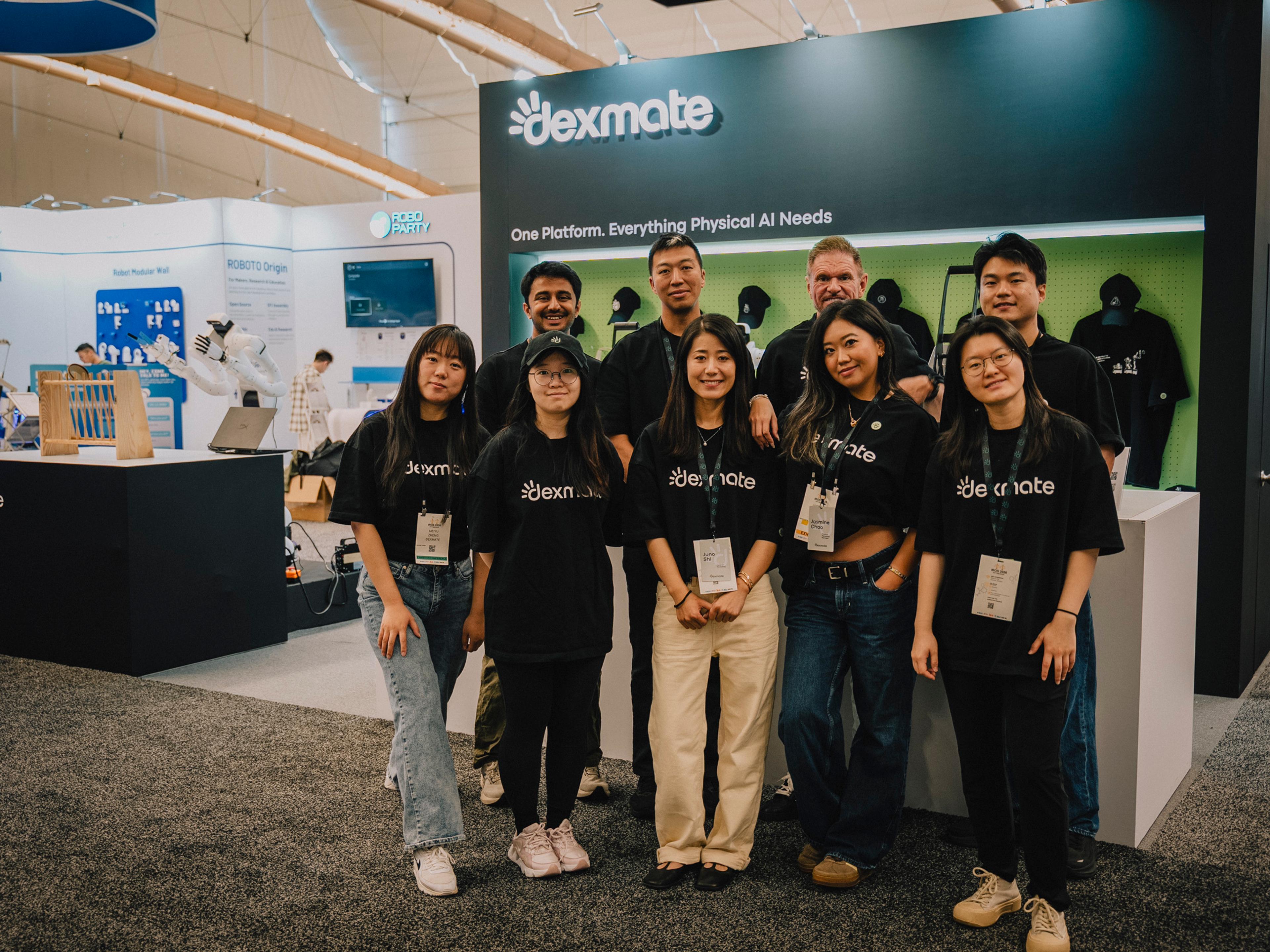 The Dexmate team at a trade show booth
