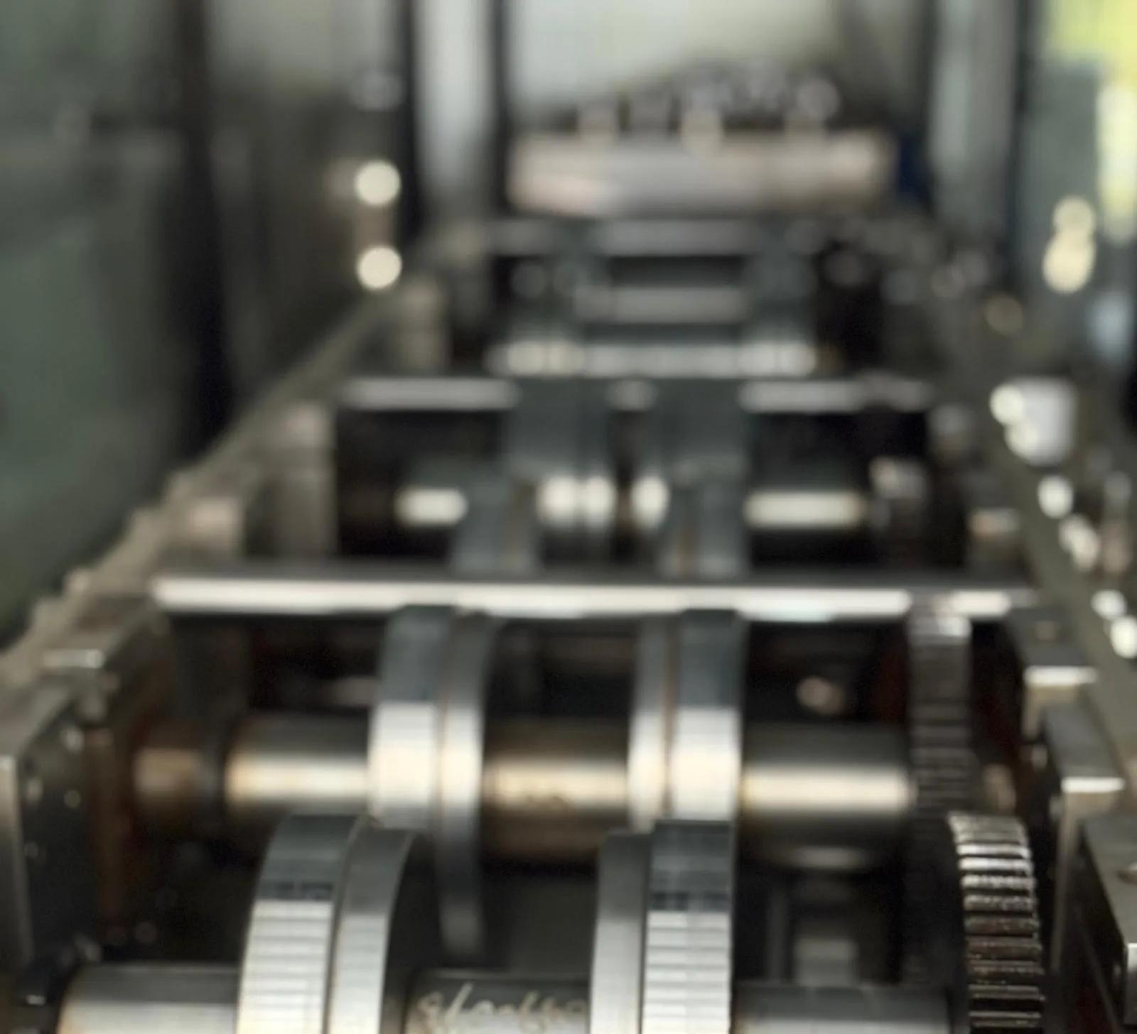 Roll-forming machine producing light gauge steel frames