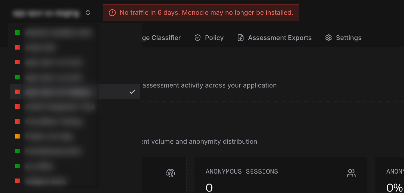 Monocle dashboard showing an alert that no traffic has been detected in six days and the application selector open.