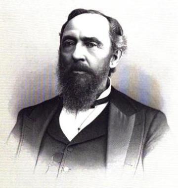 Archival portrait of John J. McGilvra, with a beard and dark suit, circa 1890