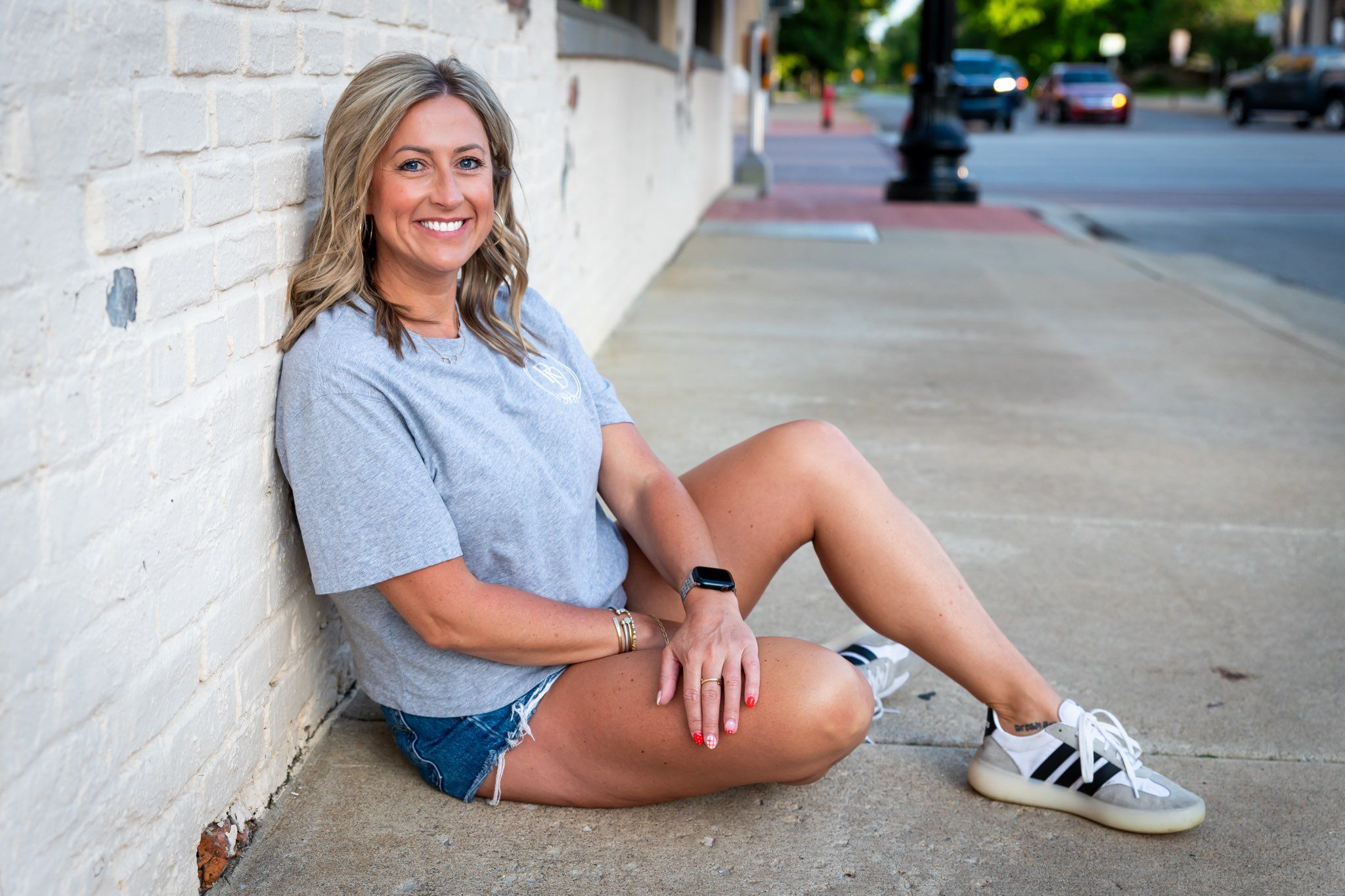 Staci Perkins relaxing outdoors, off the clock.