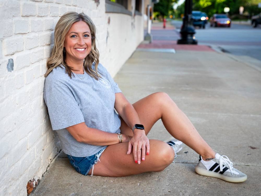 Staci Perkins relaxing outdoors, off the clock.