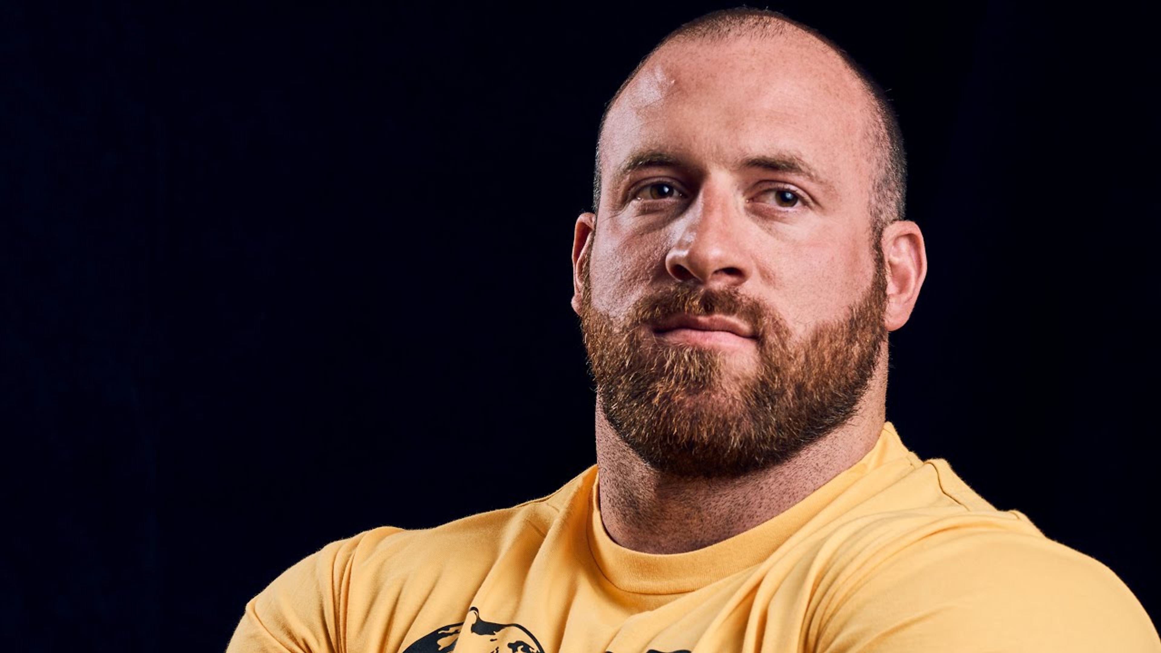 Kevin Faires competing in strongman
