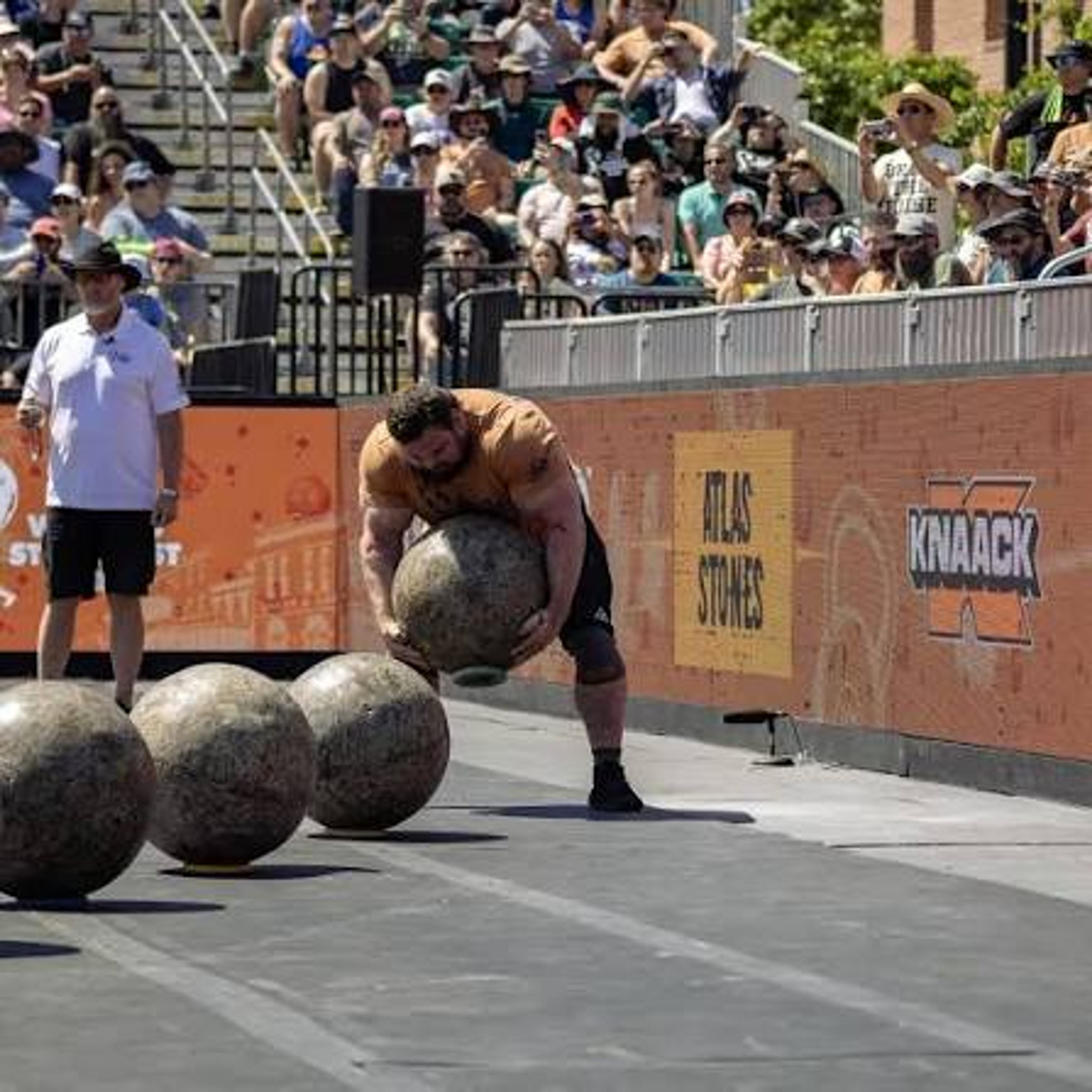 Trey Mitchell competing in strongman