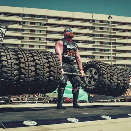 Andrea Invernizzi competing in strongman