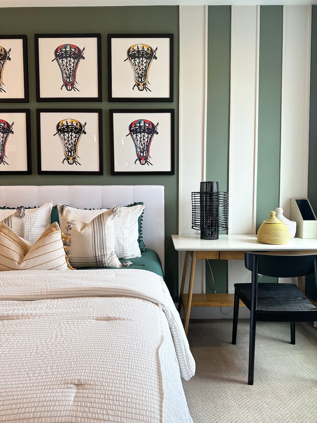 Using an Accent Wall in this Tween Bedroom with molding details elevated the look and adding in neutral bedding and green accents