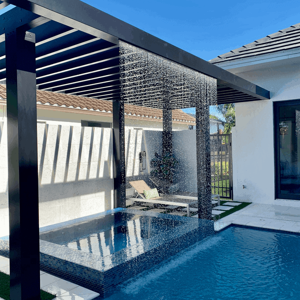 Your Swimming Pool Design Needs One of These Water Features