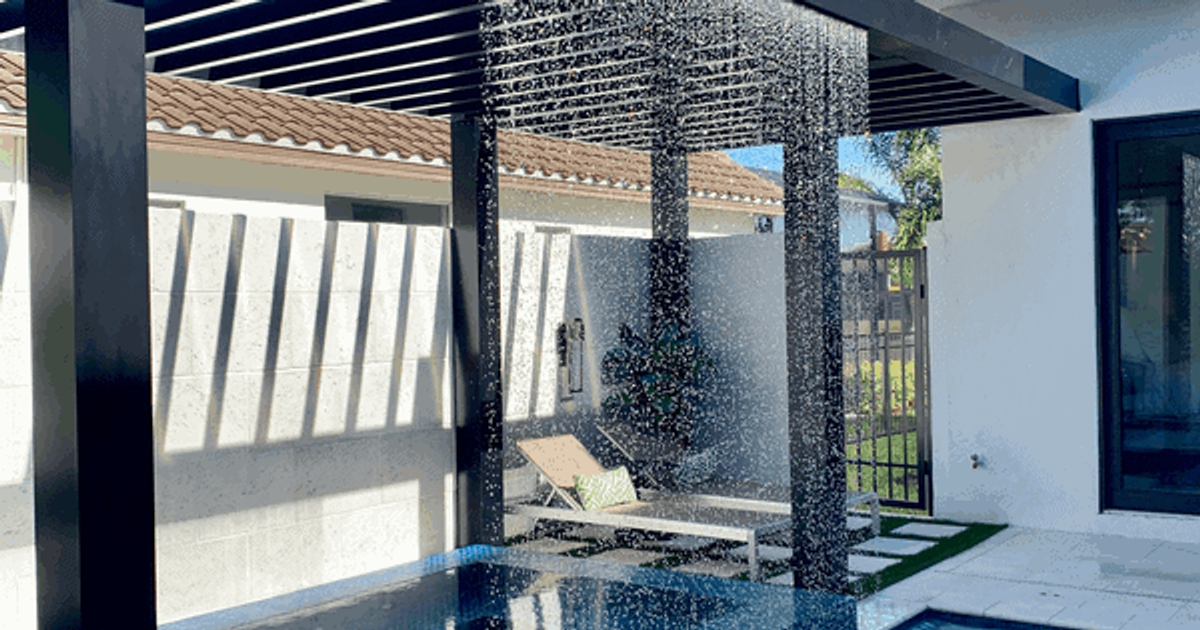 Your Swimming Pool Design Needs One of These Water Features