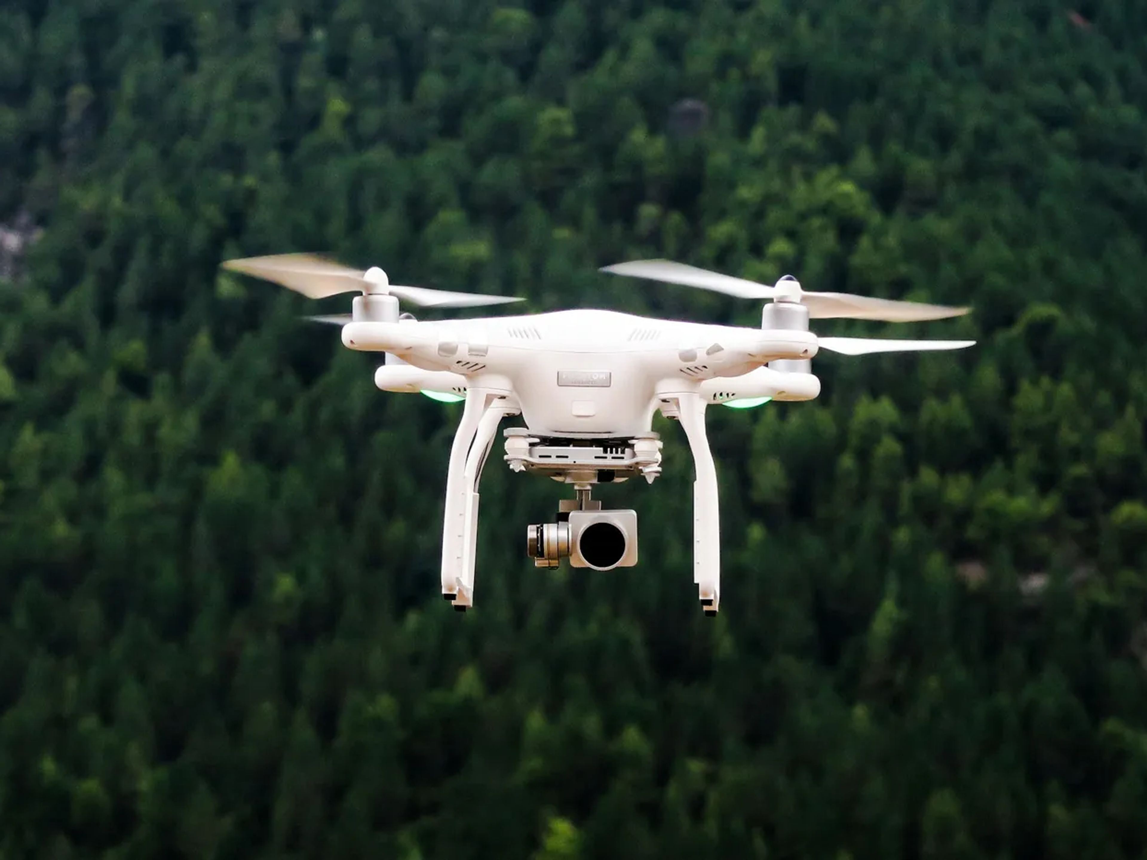 Drone flying over a forest