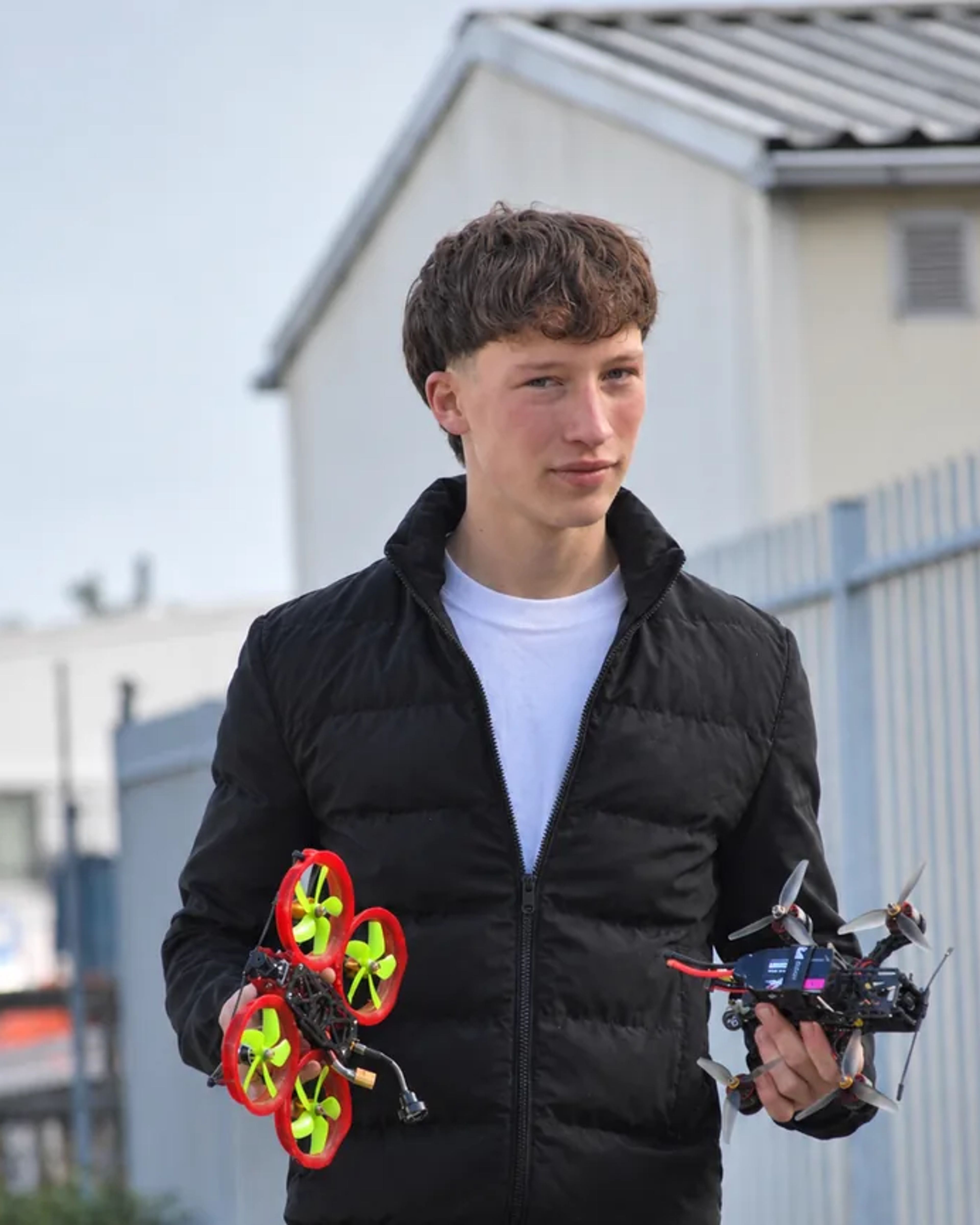 Ralf holding two FPV drones