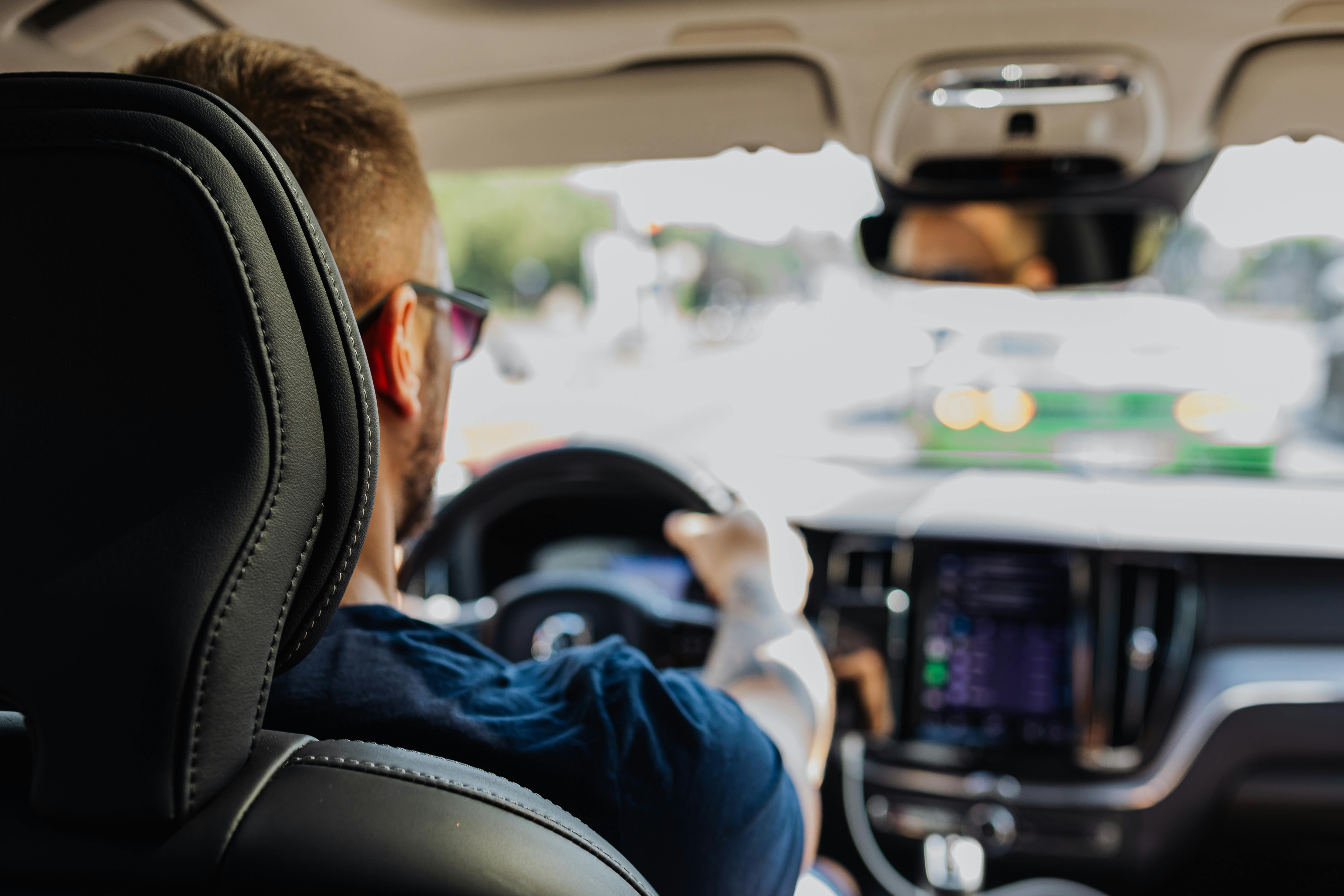 Person driving through bright New Jersey traffic on Mother’s Day before a possible holiday car crash