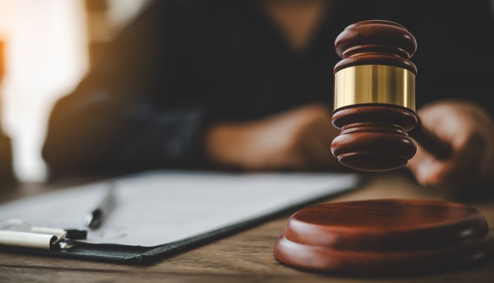 Judge’s gavel on a desk during a federal court case involving an Uber sexual assault verdict