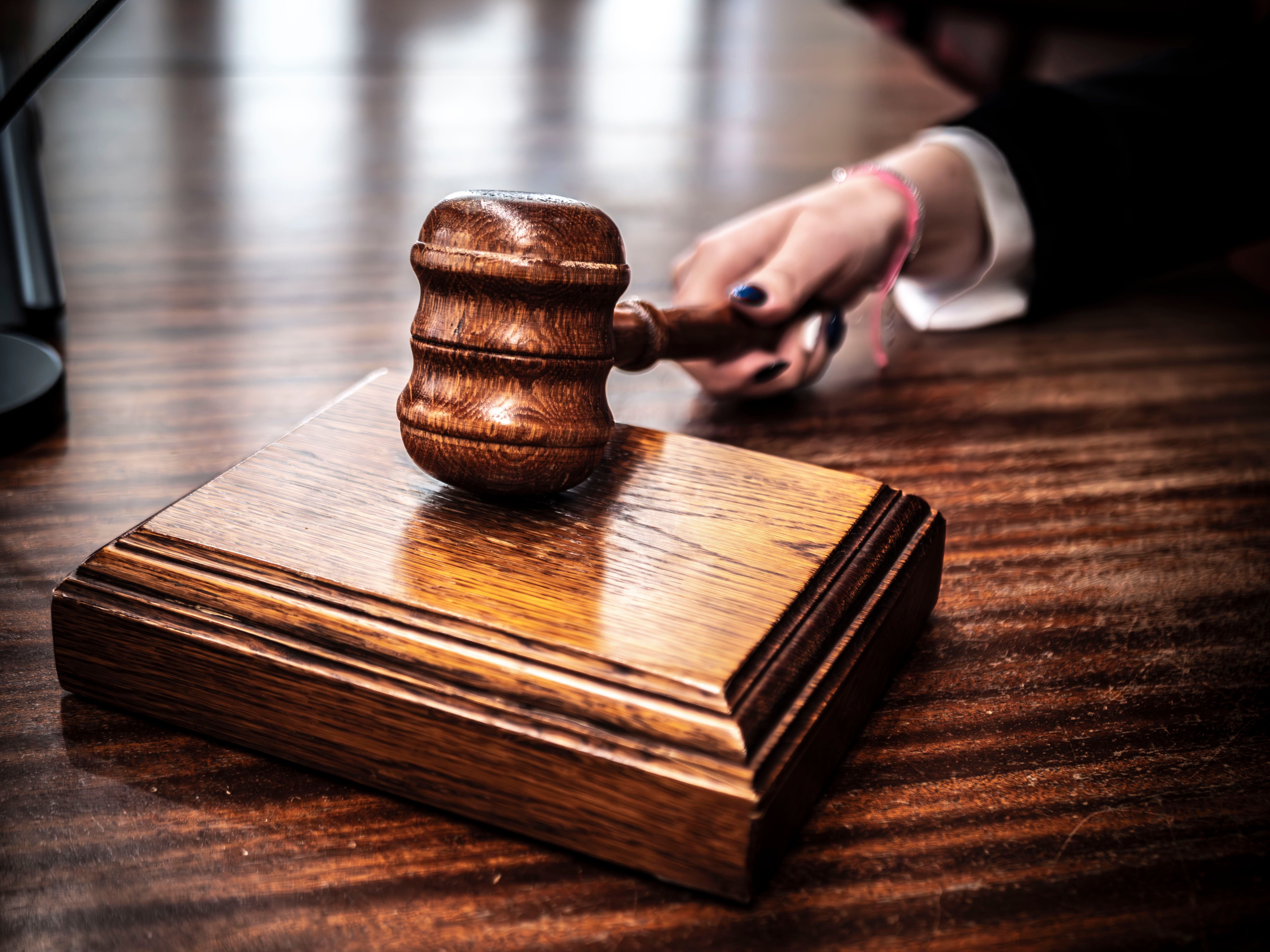 Image New Jersey criminal defense lawyer reviewing a pretrial detention appeal order at Camili & Capo, PA