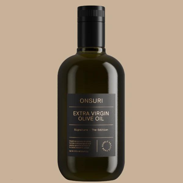 A bottle of ARBEQUINA SP-1 extra virgin olive oil