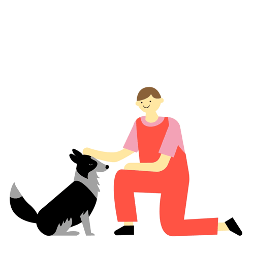 En gutt klapper en hund