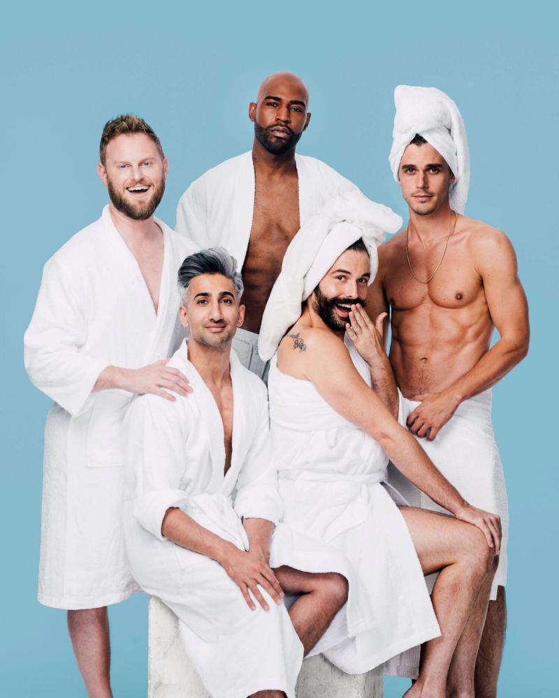 The cast of Queer Eye, featuring Antoni Porowski, Bobby Berk, Jonathan Van Ness, Tan France and Karamo Brown, all wearing white robes and towels, photographed for Time Out Magazine by Taylor Miller, a celebrity and fashion photographer. 