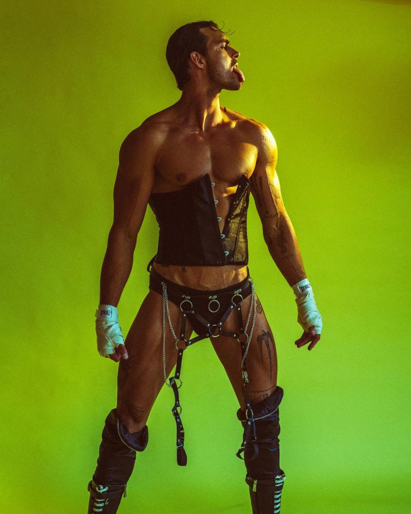 Model Christian Hogue, wearing a corset and chains, photographed for Numéro Netherlands shot by photographer Taylor Miller.